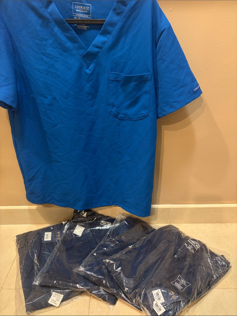 Cherokee women’s scrubs, 3 tops & 2 bottoms, brand new size xs